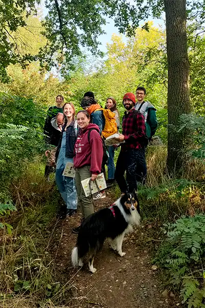 Group of walkers with a dog during a Maashrooms walk